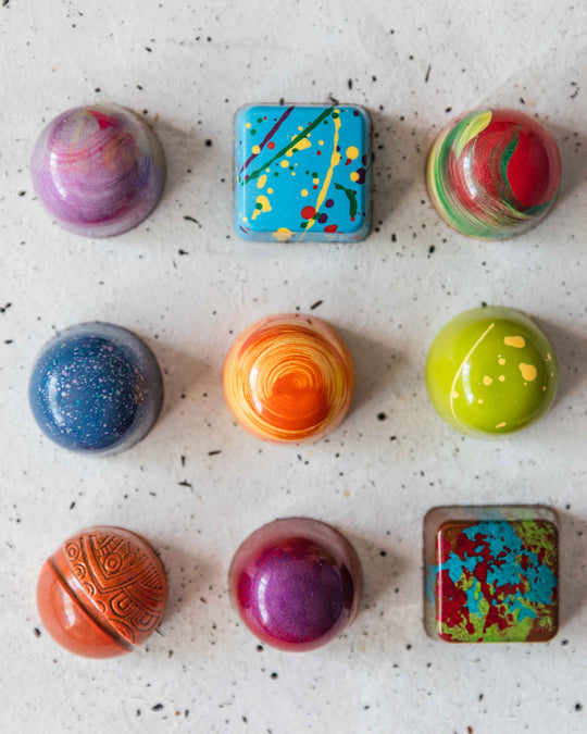 nine bonbons displayed like a grid