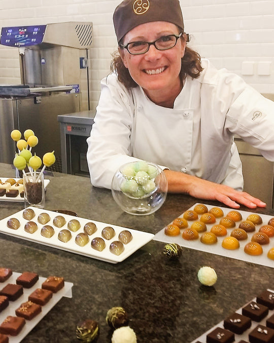 Phyllis working with chocolate while abroad